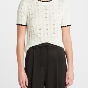 Elegant Cream Knit Top with Black Trim